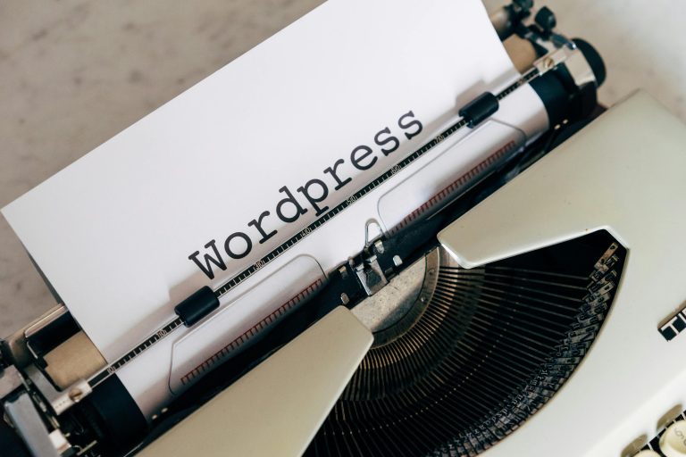 Vintage typewriter displaying WordPress - representing community blogging and content creation